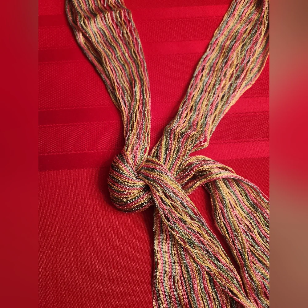 Multicoloured knitted scarf with fringe #knitwear #festival